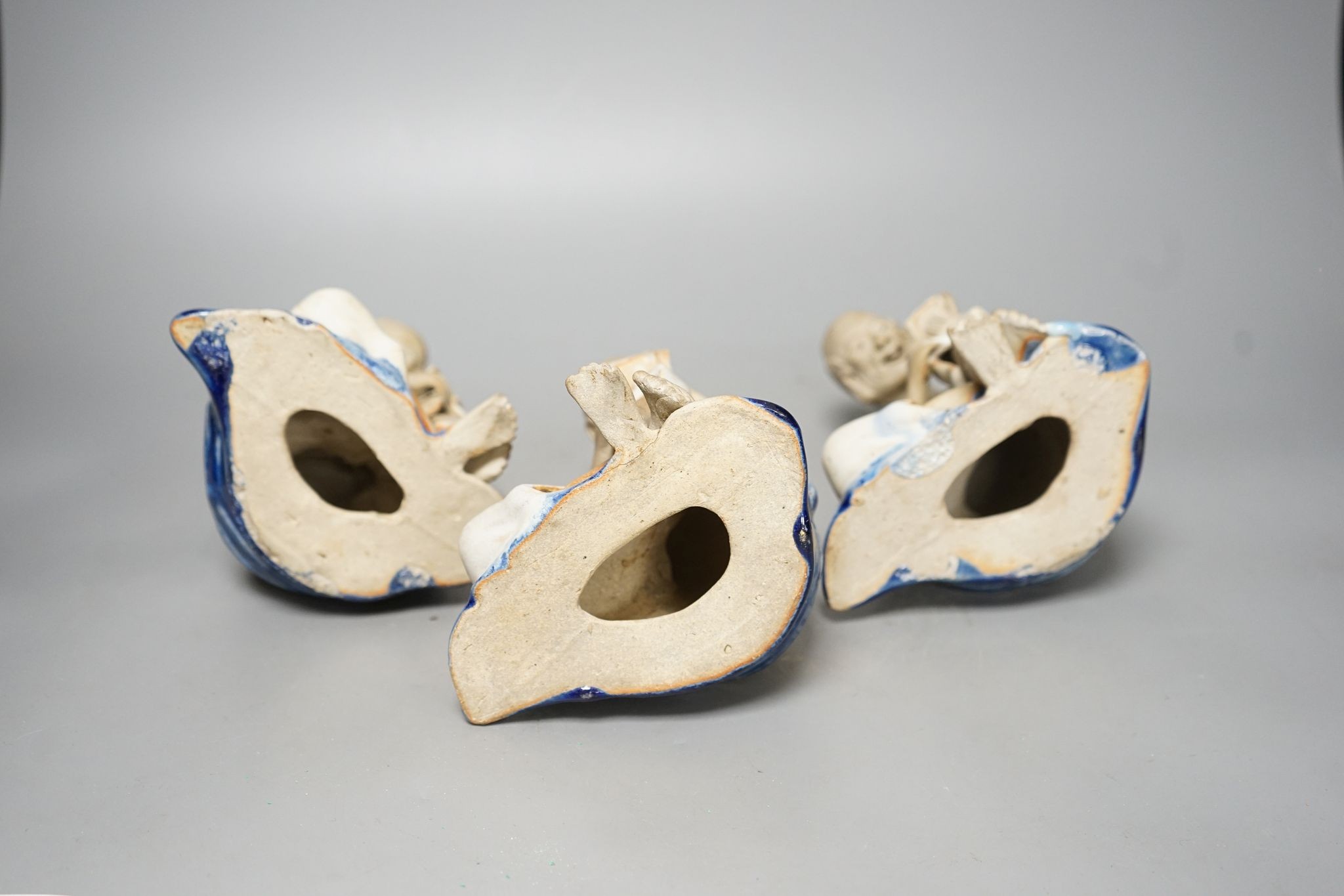 A set of three Shiwan pottery figures of Inohan, 17cm